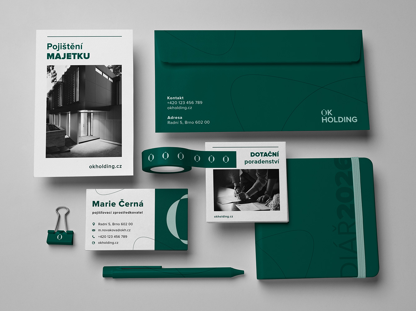 ok-holding-firemni-branding-system Ukázka firemního brandingu OK HOLDING – prezentace vizuální identity po rozsáhlém rebrandingu finanční skupiny.
